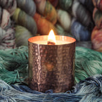 Load image into Gallery viewer, Lit han poured soy wax candle in hammered copper tin
